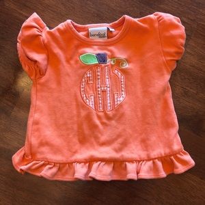 Adorable “CJH” monogrammed pumpkin ruffle T-shirt